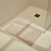 Natural Plush Bath Mat On Floor